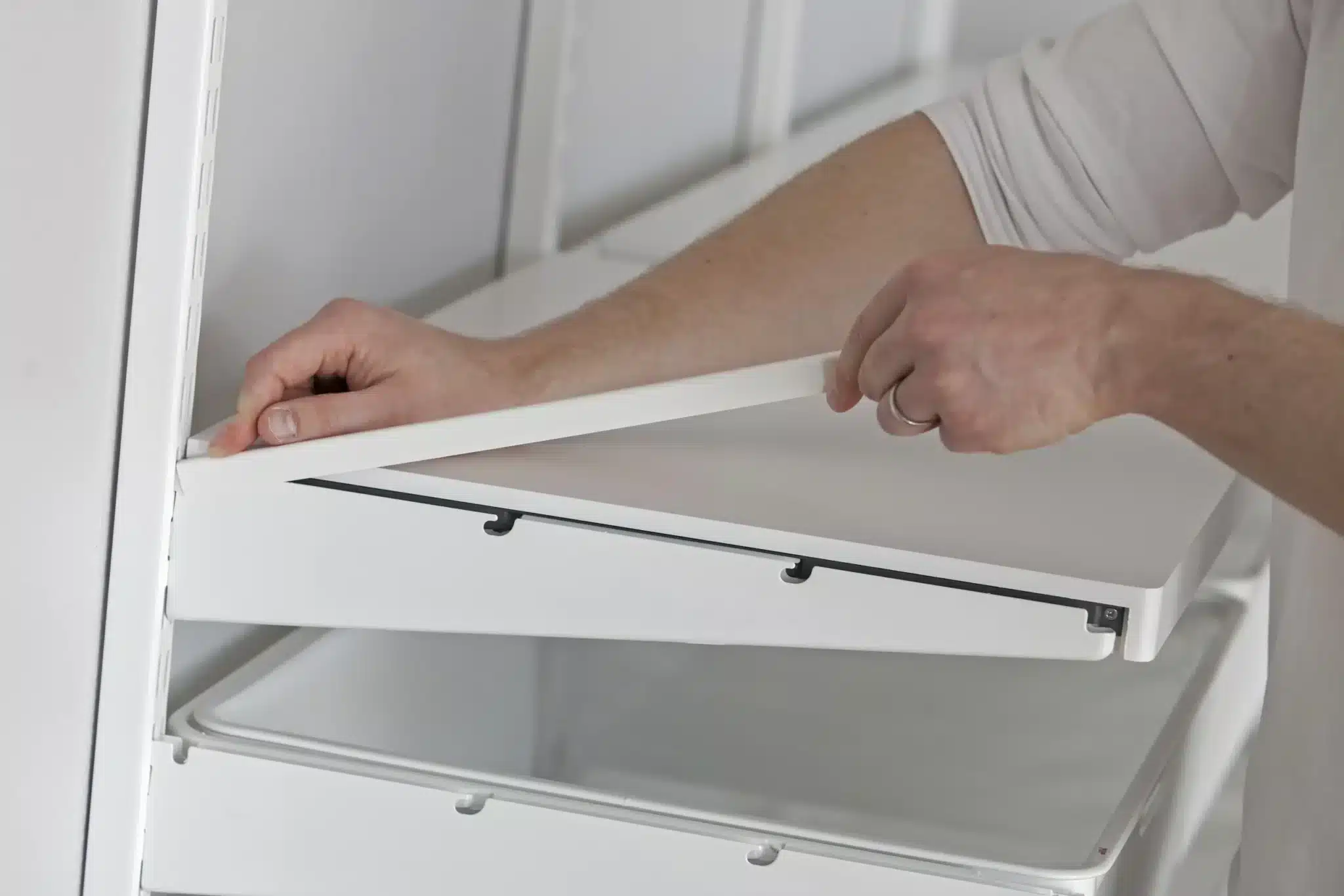 Nasazení krytky konzole Click-in